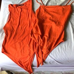 Lot of 2 Orange Bodysuits Women’s Size Medium